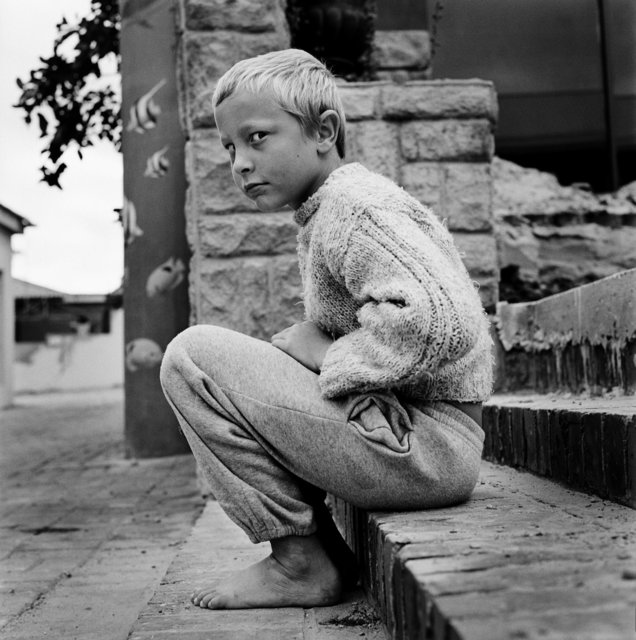 Katharine Cooper, ‘Richard Schoeman, 8 Years Old, on the Steps at Jeffreysbaai, South Africa - White Africans’, 2013, FLATLAND