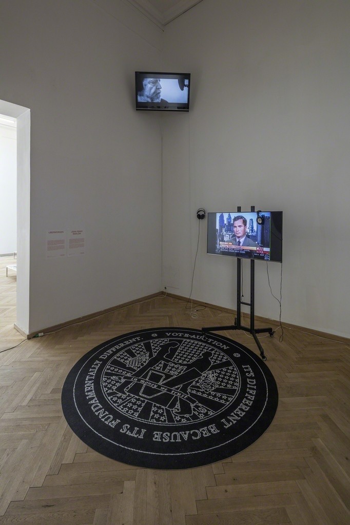 Ubermorgen, "Vote-Auction", 2000. Video, 27:08 min., carpet. Installation view from 'Whistleblowers & Vigilantes, Kunsthal Charlottenborg, 2017. Courtesy of the artists and Carroll/Fletcher Gallery, London. Photo by Anders Sune Berg. Ubermorgen, "Vote-Auction", 2000. Video, 27:08 min., carpet. Installation view from 'Whistleblowers & Vigilantes, Kunsthal Charlottenborg, 2017. Courtesy of the artists and Carroll/Fletcher Gallery, London. Photo by Anders Sune Berg.