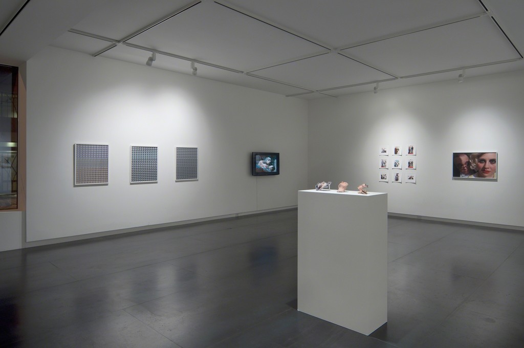 Left to right: three photographic prints by Julie Perini, video by Julie Perini, 3D printed sculptures by Lorna Barnshaw, ten photographic prints by Jordan Rathus. Left to right: three photographic prints by Julie Perini, video by Julie Perini, 3D printed sculptures by Lorna Barnshaw, ten photographic prints by Jordan Rathus.