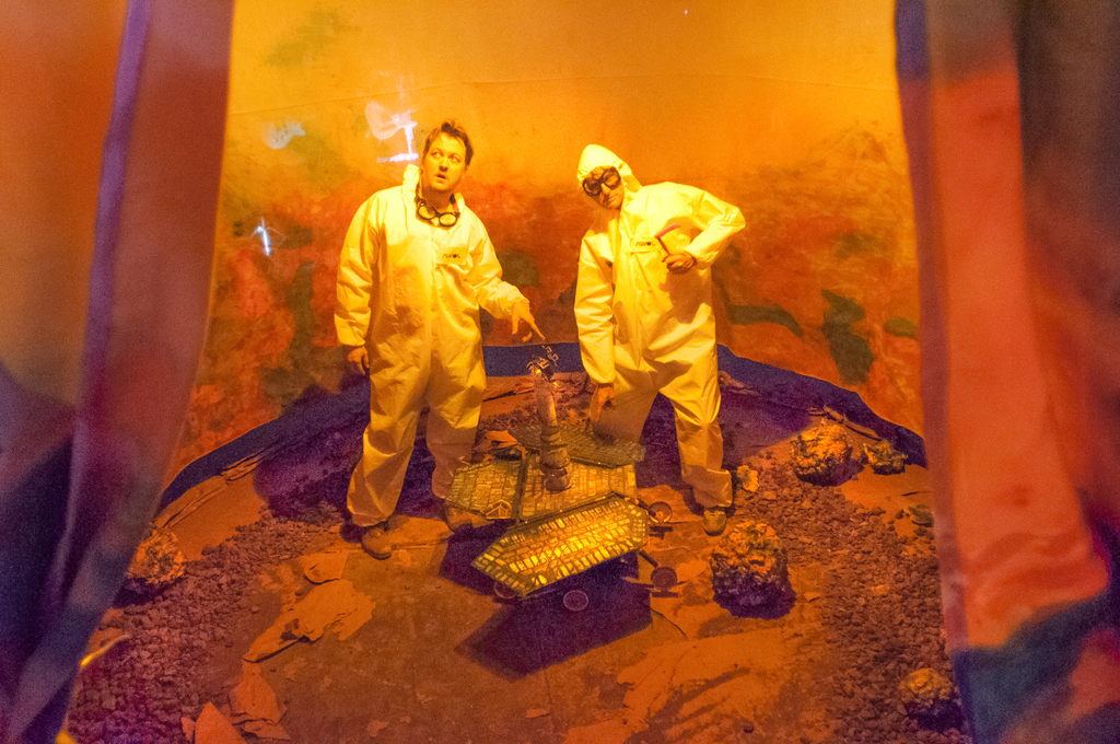 installation view of "Mare Tenebrarum" at the Museum of Human Achievement in Austin Texas. Jim Ovelmen and Andrew West in cleanroom suits installation view of "Mare Tenebrarum" at the Museum of Human Achievement in Austin Texas. Jim Ovelmen and Andrew West in cleanroom suits