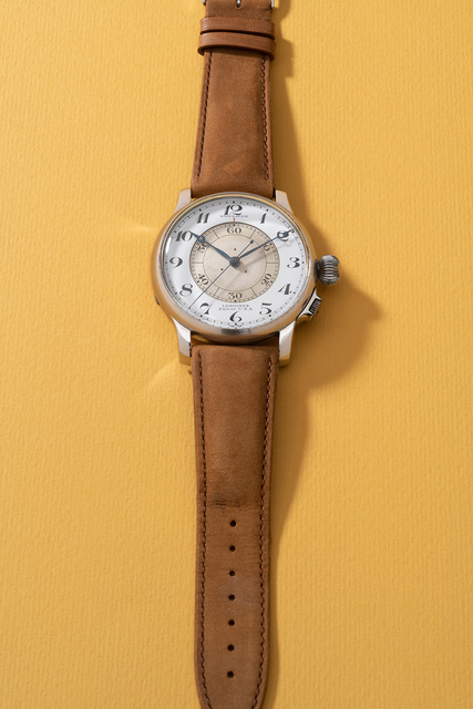 Longines, ‘A fine, rare and large stainless steel pilot’s wristwatch with center seconds and enamel dial, retailed by Wittanuer’, 1940, Phillips