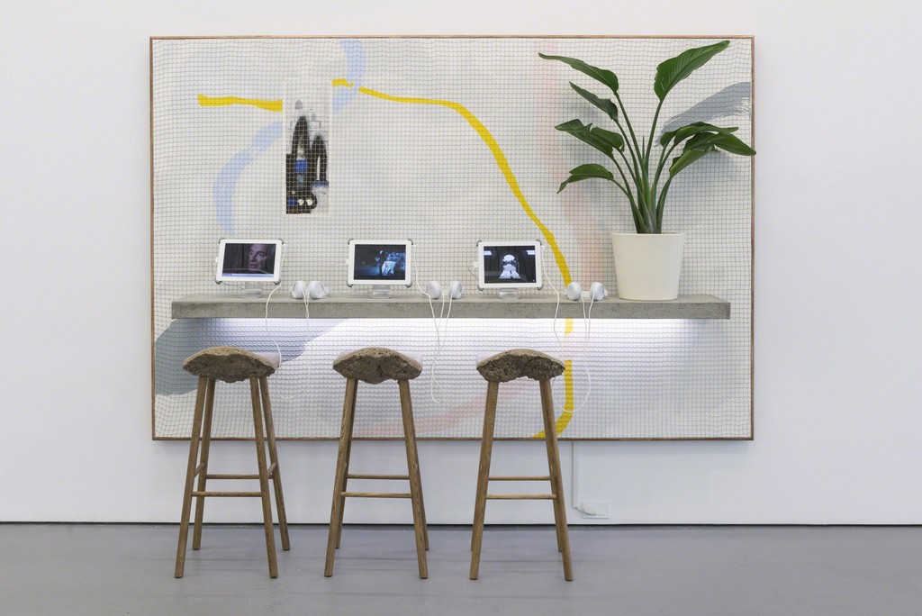 Christopher Kulendran Thomas, 2018, acrylic on canvas, concrete shelf, LEDs, plant, stools and "60 Million Americans Can't Be Wrong" film (HD, 22:12) Christopher Kulendran Thomas, 2018, acrylic on canvas, concrete shelf, LEDs, plant, stools and "60 Million Americans Can't Be Wrong" film (HD, 22:12)