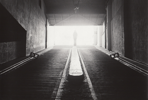Ed Sievers, ‘Untitled (figure at garage entrance)’, ca. 1960, Photography, Vintage silver print, Robert Mann Gallery