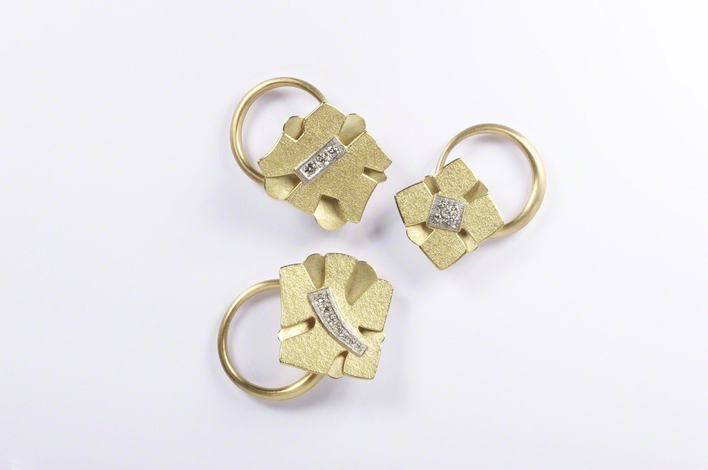 Jacqueline Mina at CAA, three rings, 18ct, platinum, diamonds, photo by Neil Mason Jacqueline Mina at CAA, three rings, 18ct, platinum, diamonds, photo by Neil Mason