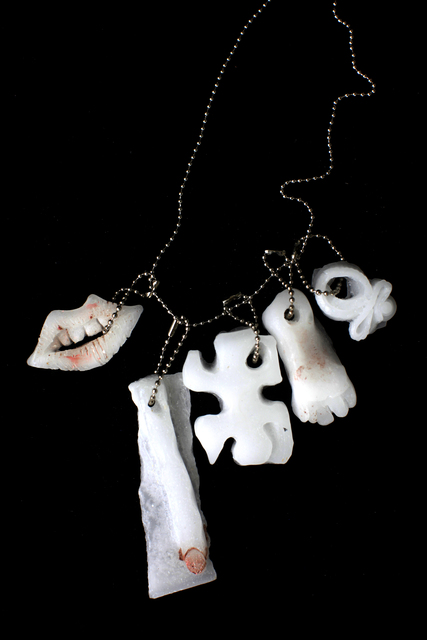 Naomi Fisher, ‘Lips, finger, puzzle, foot, squiggle’, 2016, Sculpture, Handmade peppermint essential oil infused paraffin wax and pigment charms on chain, Cultured Magazine