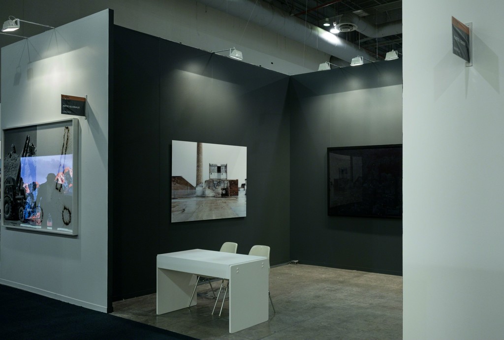 Installation view of Arte Globale booth at ZsONAMACO FOTO (E104) with works by Aristotle Roufanis and Mitra Tabrizian. Installation view of Arte Globale booth at ZsONAMACO FOTO (E104) with works by Aristotle Roufanis and Mitra Tabrizian.