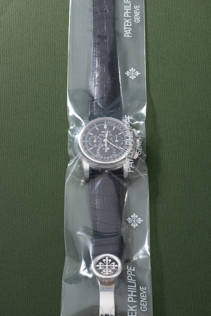 Patek Philippe, ‘A rare and highly attractive platinum perpetual calendar chronograph wristwatch with moonphases, additional caseback, setting pin, certificate of origin and box, factory sealed’, Circa 2009, Fashion Design and Wearable Art, Platinum, Phillips