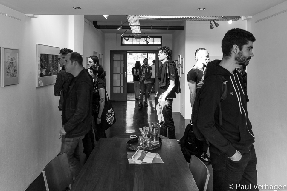 Visitors during Roadburn Festival for the solo exhibition 'Brilliant Shadows' by Arik Roper. Visitors during Roadburn Festival for the solo exhibition 'Brilliant Shadows' by Arik Roper.