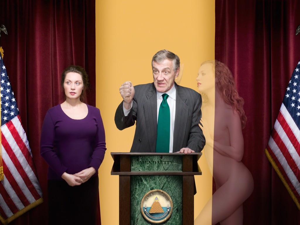 Brian Dailey is an American artist whose body of work bears an array of political and social aspects. The issue of domination and power can very lucidly be observed in his series Tableau Vivant. Dailey creates composite photo-based images that portray a narrative that includes pose, gesture and interaction that suggests the subjects’ dominated or dominative nature. In this series, the artist used stage design, props, actors, theatrical lighting and composite imagery to create complex scenes. Brian Dailey is an American artist whose body of work bears an array of political and social aspects. The issue of domination and power can very lucidly be observed in his series Tableau Vivant. Dailey creates composite photo-based images that portray a narrative that includes pose, gesture and interaction that suggests the subjects’ dominated or dominative nature. In this series, the artist used stage design, props, actors, theatrical lighting and composite imagery to create complex scenes.