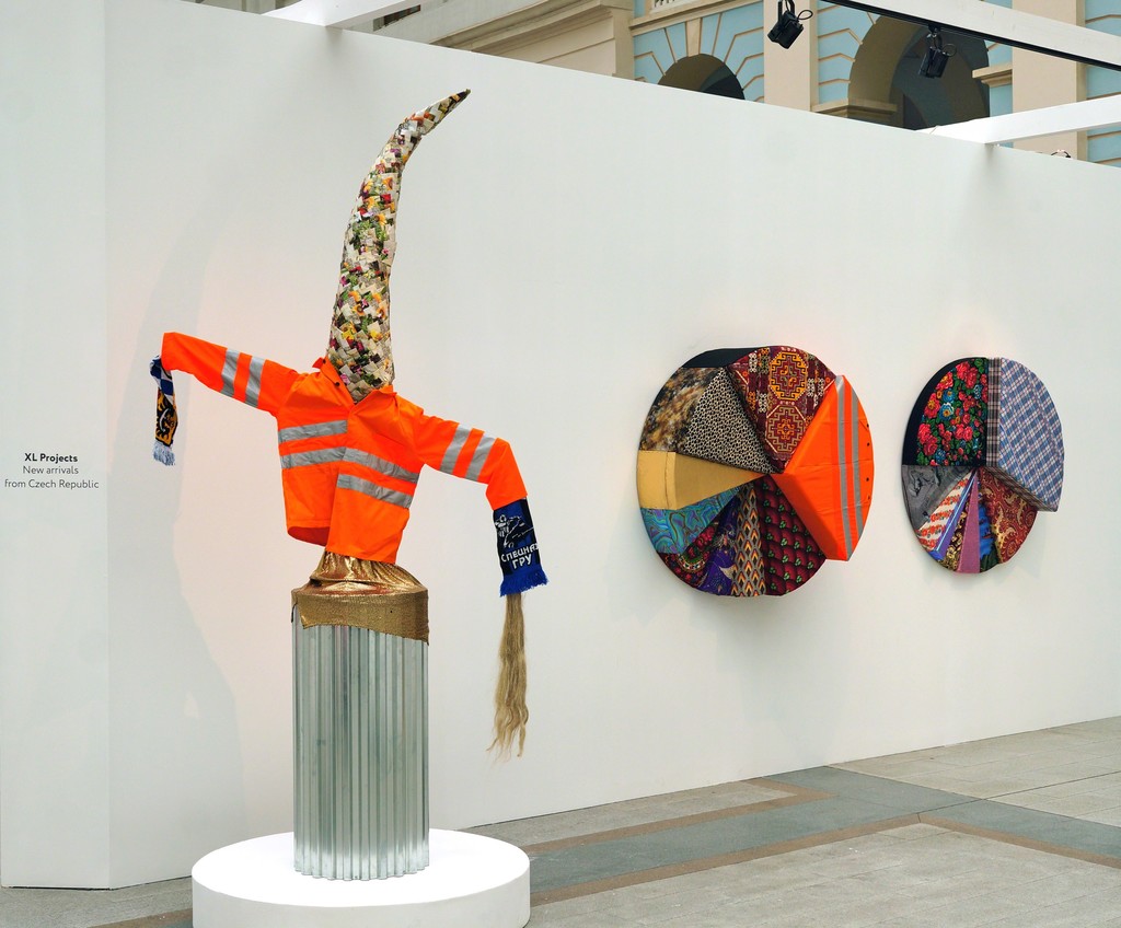 Stand view with Scarecrow (left) and works from Infographics deris (center, right) by Irina Korina Stand view with Scarecrow (left) and works from Infographics deris (center, right) by Irina Korina