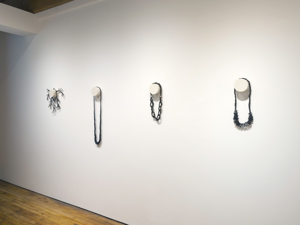 Artwork by Sonya Clark (From left to right)
"Hair Necklace 5" 2006, "Hair Necklace 6" 2011, "Hair Necklace 4" 2012, "Hair Necklace 1" 2012 Artwork by Sonya Clark (From left to right)
"Hair Necklace 5" 2006, "Hair Necklace 6" 2011, "Hair Necklace 4" 2012, "Hair Necklace 1" 2012