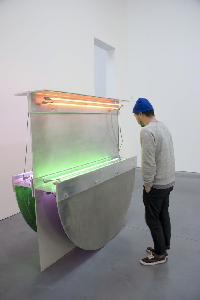 A visitor explores Keith Sonnier's "Cycladic Extrusion I," 1988. Neon and aluminum, 73 1/2 x 73 3/8 x 42 1/2 inches. Parrish Art Museum, Water Mill, New York, Gift of Barbara Bertozzi Castelli in honor of Dorothy Lichtenstein, 2009.2. Photo: Daniel Gonzalez. A visitor explores Keith Sonnier's "Cycladic Extrusion I," 1988. Neon and aluminum, 73 1/2 x 73 3/8 x 42 1/2 inches. Parrish Art Museum, Water Mill, New York, Gift of Barbara Bertozzi Castelli in honor of Dorothy Lichtenstein, 2009.2. Photo: Daniel Gonzalez.