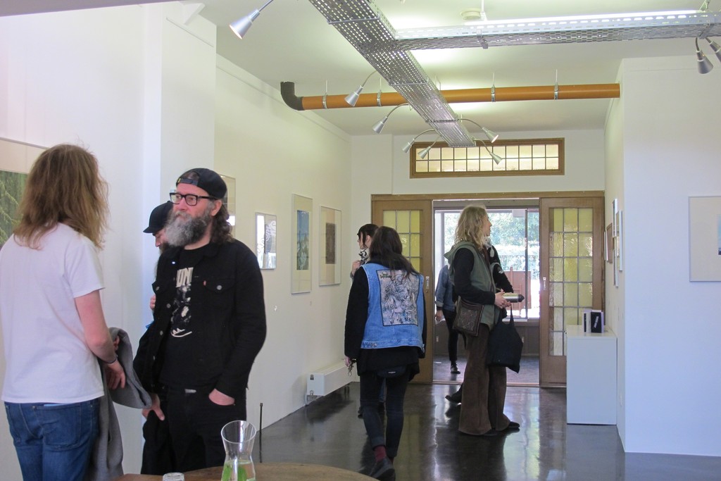 Visitors during Roadburn Festival for the solo exhibition 'Brilliant Shadows' by Arik Roper. Visitors during Roadburn Festival for the solo exhibition 'Brilliant Shadows' by Arik Roper.