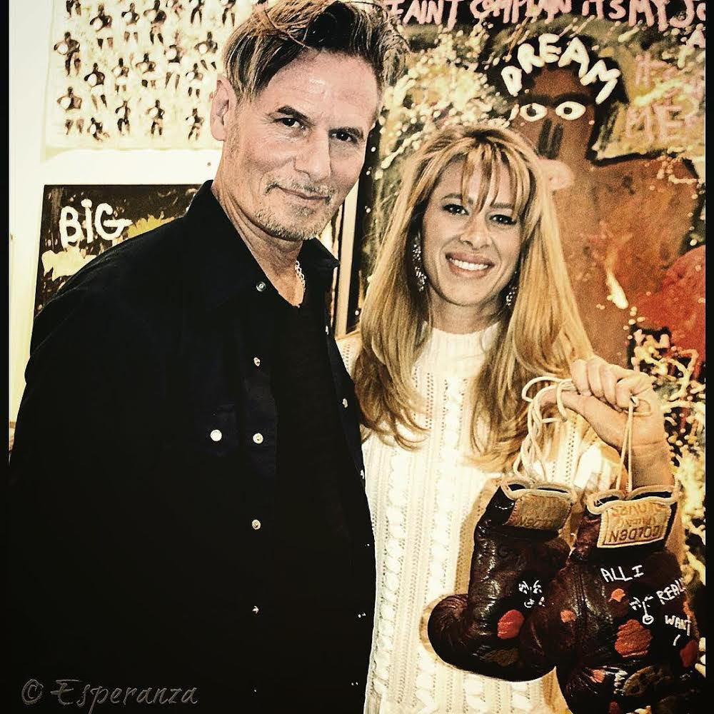 Artist Richard Kurtz with new collector • Art Palm Springs 2018
Hi young woman was bullied as a child, so because a boxer. She collected
these painted boxing gloves for her home gym. "All I Really Want Is You"
Casein on found vintage boxing gloves. • Esperanza Projects
One of our hashtags is #artheals Artist Richard Kurtz with new collector • Art Palm Springs 2018
Hi young woman was bullied as a child, so because a boxer. She collected
these painted boxing gloves for her home gym. "All I Really Want Is You"
Casein on found vintage boxing gloves. • Esperanza Projects
One of our hashtags is #artheals
