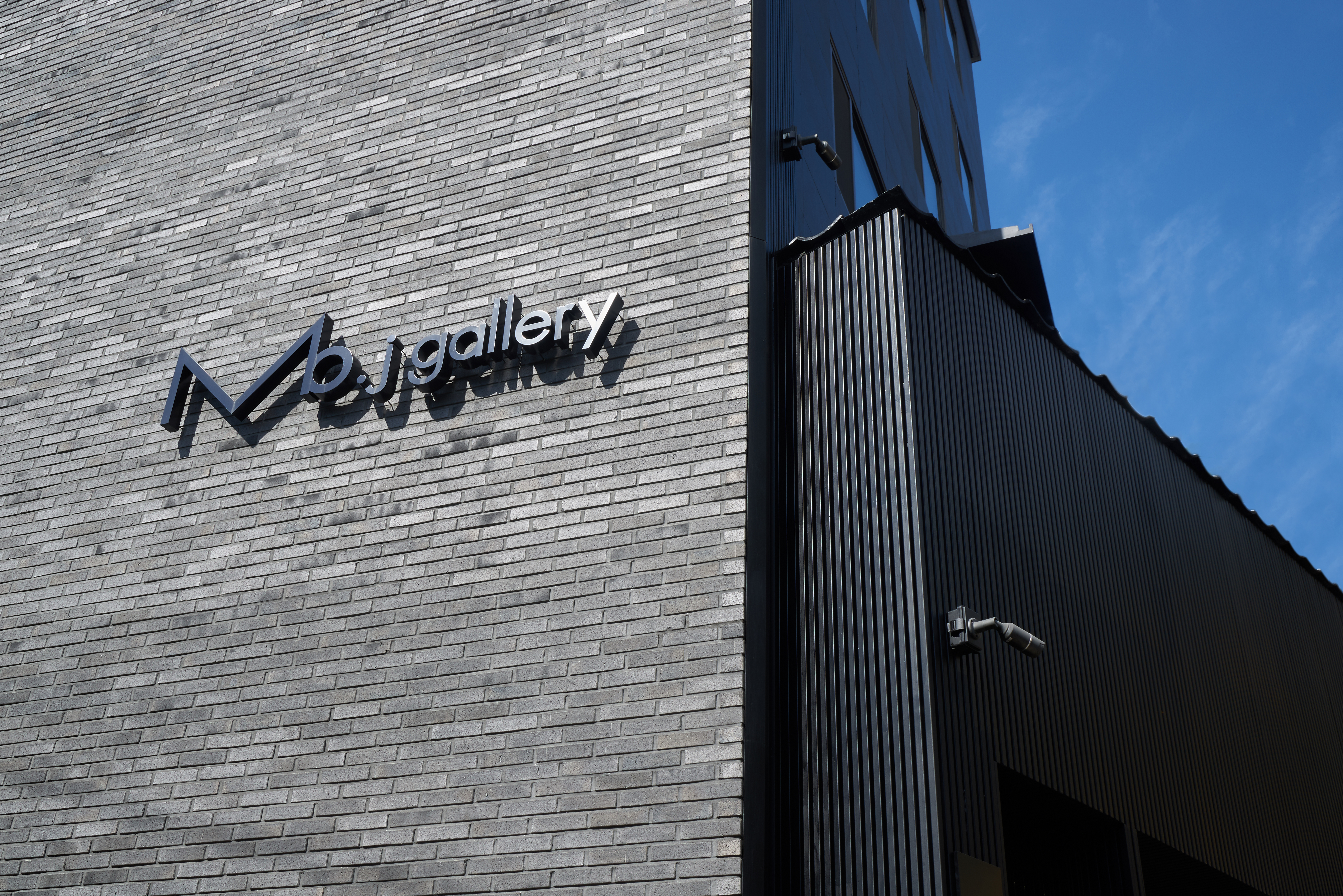 Mo J Gallery logo