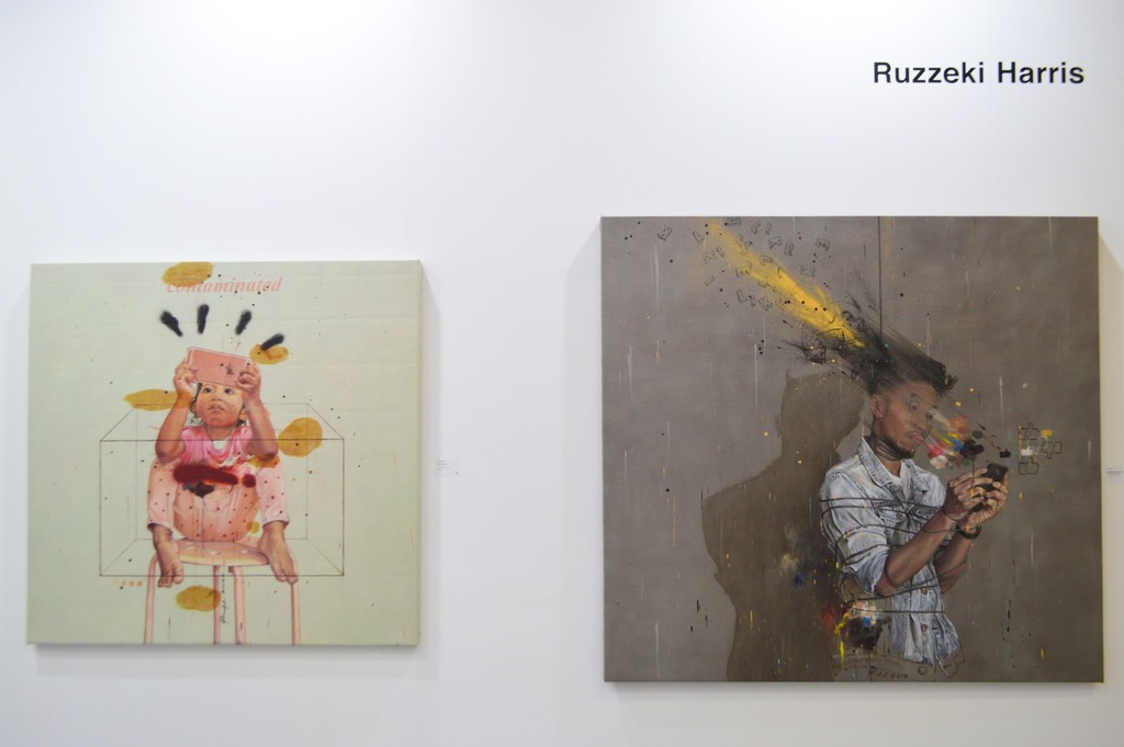 Ruzzeki Harris, Art Taipei 2016: "Contaminated" (left) and "My Soul Needs Likes" (right)
A father/daughter combo, both works a sharp commentary on modern day gadgetry and app obsession, part of the "Possessed" series of works. Ruzzeki Harris, Art Taipei 2016: "Contaminated" (left) and "My Soul Needs Likes" (right)
A father/daughter combo, both works a sharp commentary on modern day gadgetry and app obsession, part of the "Possessed" series of works.