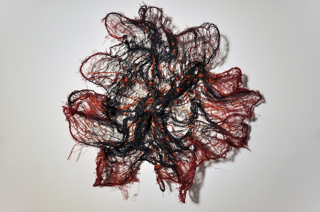 Nnenna Okore, Beneath the Surface, 2014. Burlap, dye, wire and acrylic, 142 x 142 x 31 cm. Photo: N. Okore Nnenna Okore, Beneath the Surface, 2014. Burlap, dye, wire and acrylic, 142 x 142 x 31 cm. Photo: N. Okore
