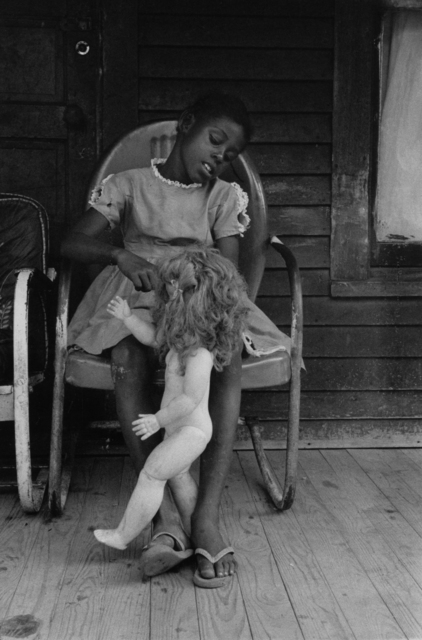 Bruce Davidson, ‘Child on a Front Porch Playing with her Doll Baby, Shelby County, TN, 1962’, 1962, Photography, Gelatin silver print, Etherton Gallery