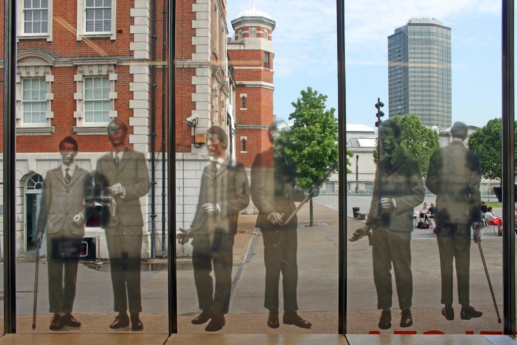 Gilbert & George as the human sculptors performing The Singling Sculpture, Nigel Greenwood Ind Ltd, 1970, re-created in vinyl with the kind permission of Gilbert & George Gilbert & George as the human sculptors performing The Singling Sculpture, Nigel Greenwood Ind Ltd, 1970, re-created in vinyl with the kind permission of Gilbert & George