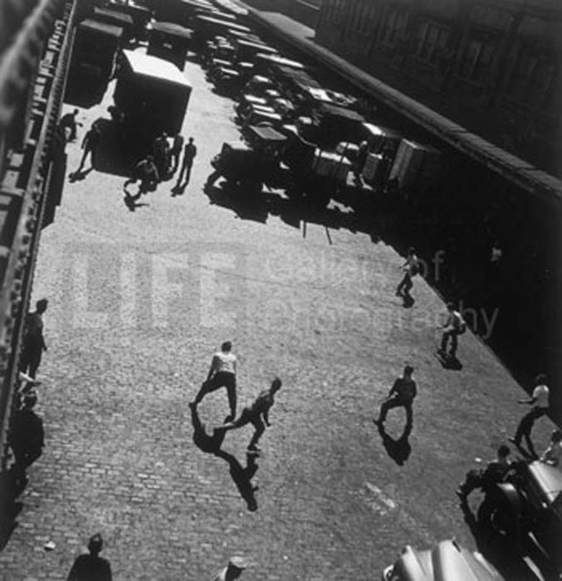 Andreas Feininger, ‘Playing Ball Outside Hudson River Pier Sheds, New York’, 1949, Photography, Silver Gelatin Print, Contessa Gallery