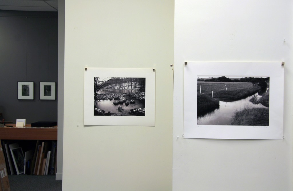 Andrew Yates, left image: "Snowy Lake Connecticut, Winter", 2003, archival digital print, 12.5 x 16.5"; right image: "Junction Drainage Streams, Cuckmere", 2006, archival digital print ed. 2/12, 11.75 x 16.5" Andrew Yates, left image: "Snowy Lake Connecticut, Winter", 2003, archival digital print, 12.5 x 16.5"; right image: "Junction Drainage Streams, Cuckmere", 2006, archival digital print ed. 2/12, 11.75 x 16.5"