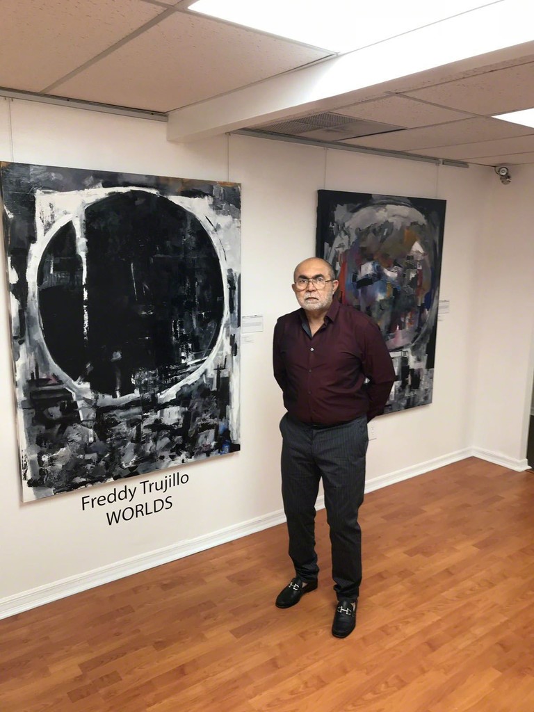 Freddy Trujillo Artists and two of his new paintings. Freddy Trujillo Artists and two of his new paintings.