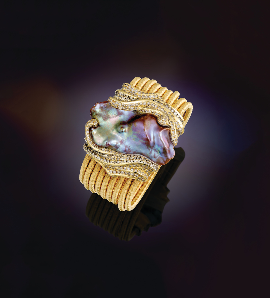 Purple free-form pearl enhanced by natural cognac diamonds in 18k hand-woven gold Purple free-form pearl enhanced by natural cognac diamonds in 18k hand-woven gold