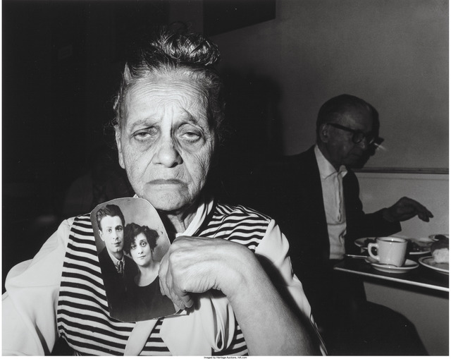 Bruce Davidson, ‘Bessie Gakaubowicz, holding a photograph of her and her husband taken before World War II’, 1966, Heritage Auctions