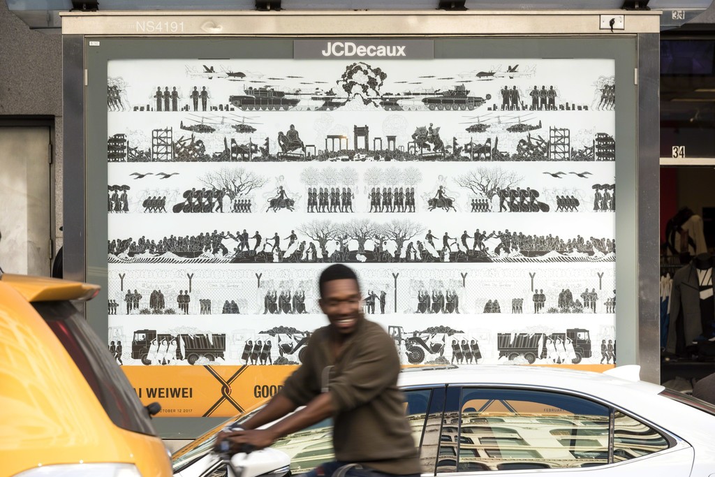 Ai Weiwei Odyssey 3, 2017 Digital print Courtesy of the artist Photo: Timothy Schenck, Courtesy of Public Art Fund On view as part of the citywide exhibition Good Fences Make Good Neighbors, presented by Public Art Fund October 12, 2017-February 11, 2018 Ai Weiwei Odyssey 3, 2017 Digital print Courtesy of the artist Photo: Timothy Schenck, Courtesy of Public Art Fund On view as part of the citywide exhibition Good Fences Make Good Neighbors, presented by Public Art Fund October 12, 2017-February 11, 2018