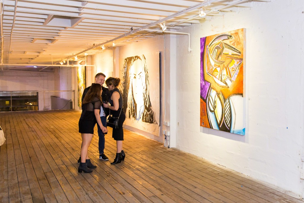 Young Miami collectors Rebecca Medvin, Yates Brown, and Stephanie Silver in front of works by Philippe Dodard and Daniela olArte.\\
Photo: Miami Ironside Young Miami collectors Rebecca Medvin, Yates Brown, and Stephanie Silver in front of works by Philippe Dodard and Daniela olArte.\\
Photo: Miami Ironside
