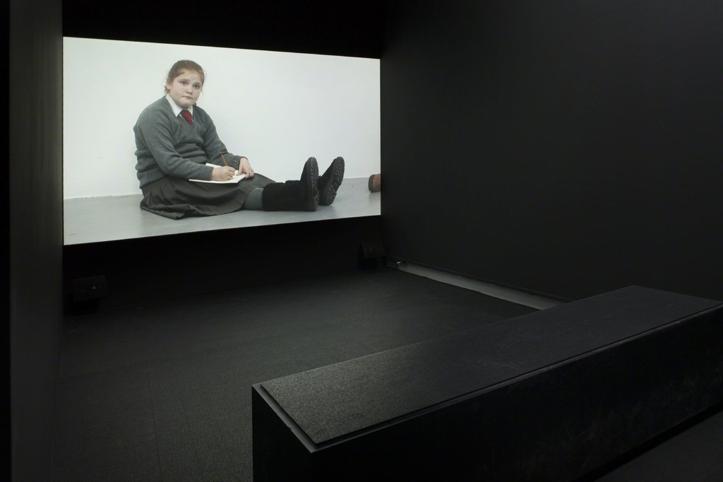 Installation shot of Rineke Dijkstra's Ruth Drawing Picasso, Tate Liverpool, UK, 2009. 1 channel HD video. Photo from the exhibition 'Fire under Snow: New film and video works at Louisiana', 27.1.-8.5.2016, Louisiana Museum of Modern Art. Installation shot of Rineke Dijkstra's Ruth Drawing Picasso, Tate Liverpool, UK, 2009. 1 channel HD video. Photo from the exhibition 'Fire under Snow: New film and video works at Louisiana', 27.1.-8.5.2016, Louisiana Museum of Modern Art.