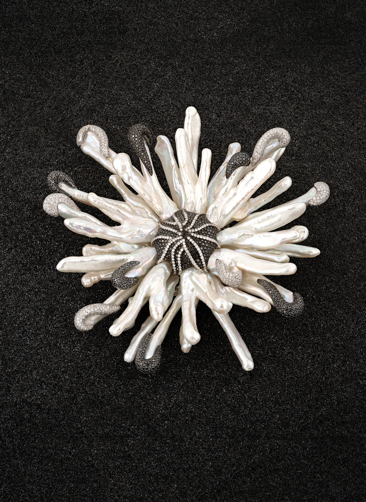 Flower Brooch
natural free-form pearls enhanced by natural black and white diamonds Flower Brooch
natural free-form pearls enhanced by natural black and white diamonds