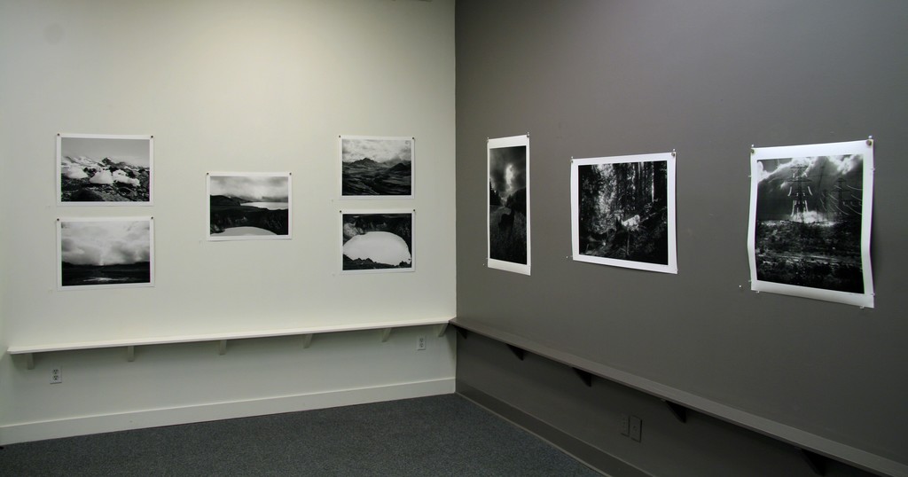 White wall: Work by Dianne Kornberg, "The landscapes were photographed on a geology trip to Greenland (“Kulusuk") and Iceland in 2002. I used a medium format film camera, and printed on Hahnemuhle rag paper.";
Grey wall: Work by Glenn Rudoplh White wall: Work by Dianne Kornberg, "The landscapes were photographed on a geology trip to Greenland (“Kulusuk") and Iceland in 2002. I used a medium format film camera, and printed on Hahnemuhle rag paper.";
Grey wall: Work by Glenn Rudoplh