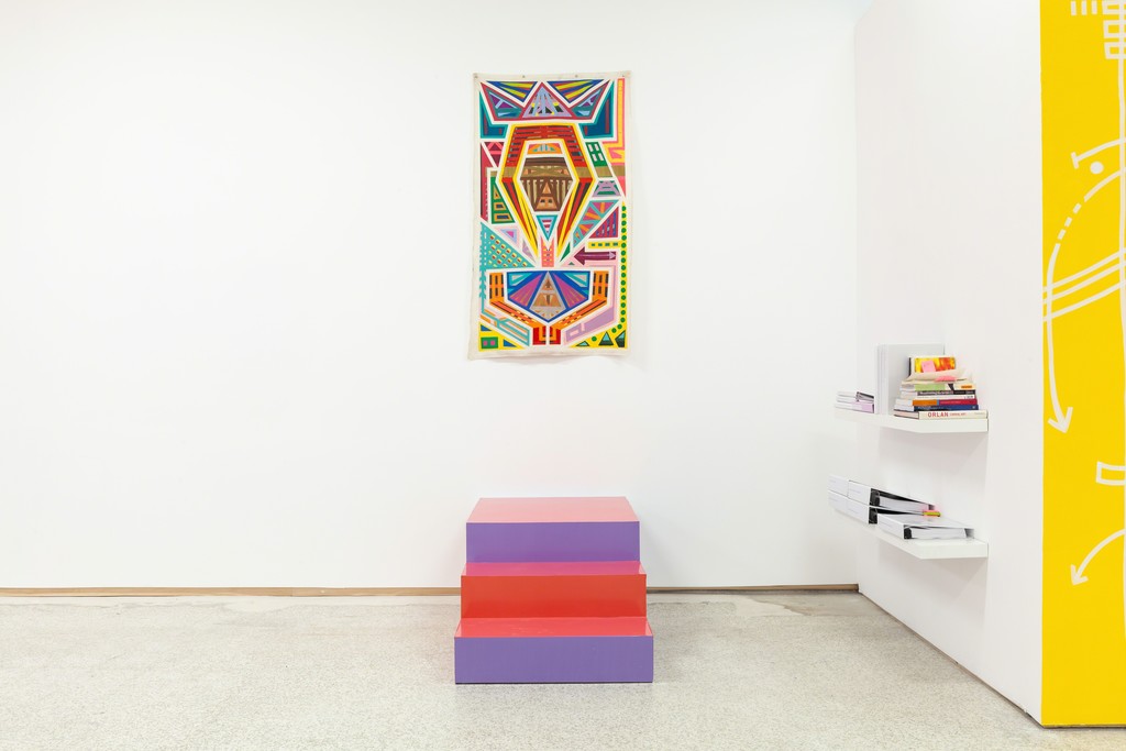 Installation view of Marcus Blake's First Queen (Quantum Kente Series), 2018. Germane Barnes and Karen Rifas' (section) Exploding Staircase, 2018 and Paradise Commons Library. Installation view of Marcus Blake's First Queen (Quantum Kente Series), 2018. Germane Barnes and Karen Rifas' (section) Exploding Staircase, 2018 and Paradise Commons Library.