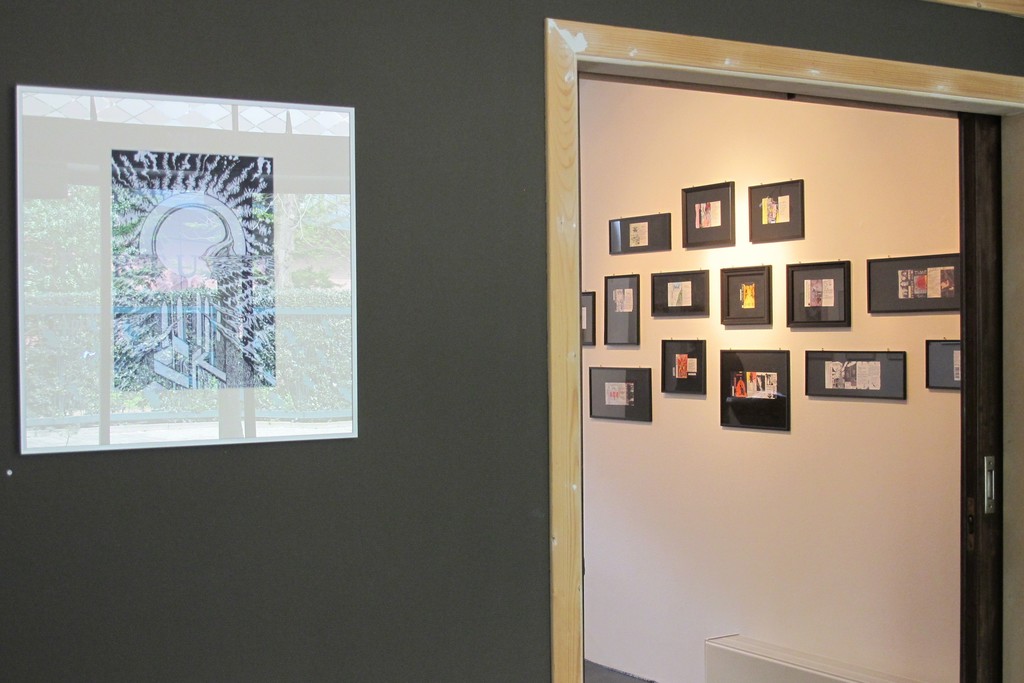 Installation overview with 'The Ocean of Mind' and a collection of illustrated cassette covers. Installation overview with 'The Ocean of Mind' and a collection of illustrated cassette covers.