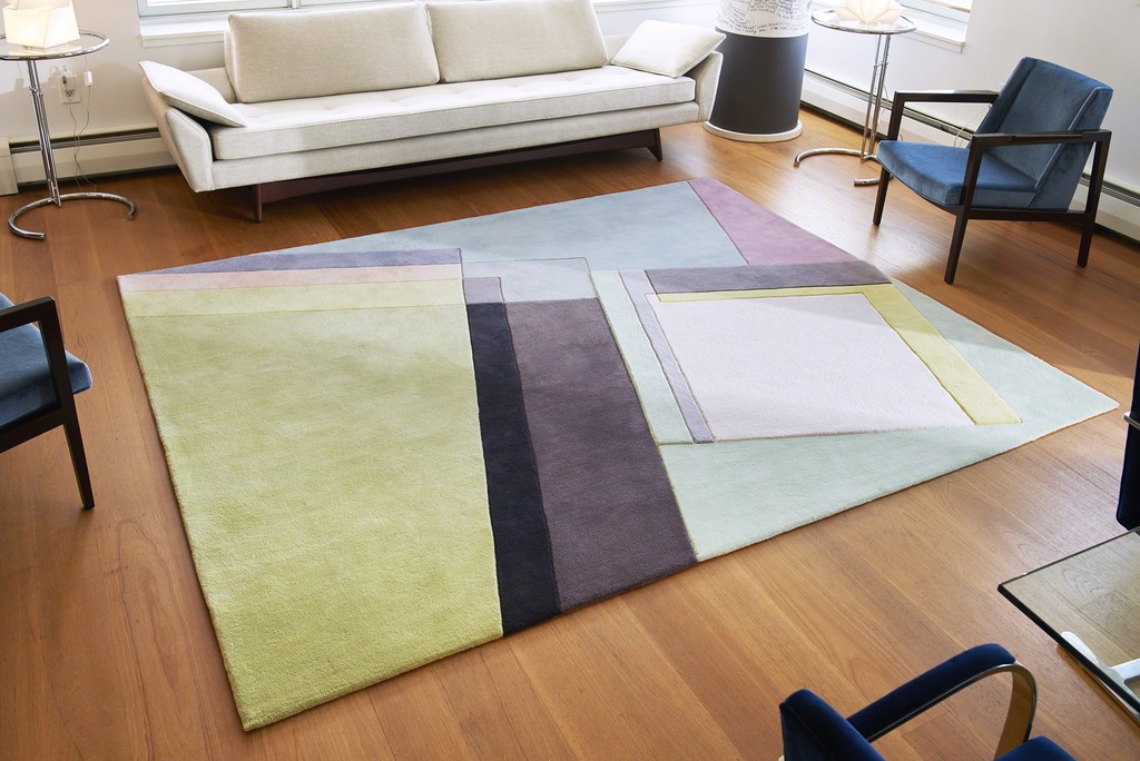 Decisive, the largest of the Art Rugs, was hand made in Thailand from all cut pile. Seligson was interested in how the three dimensionality of the painting, would translate into a rug. The rug has pencil carvings which add an additional, unexpected element to this vibrant piece. Decisive was featured in the Winter 2018 issue of Modern Magazine. 10mm and 16 mm pile height. Pencil carving. 16 colors. Decisive, the largest of the Art Rugs, was hand made in Thailand from all cut pile. Seligson was interested in how the three dimensionality of the painting, would translate into a rug. The rug has pencil carvings which add an additional, unexpected element to this vibrant piece. Decisive was featured in the Winter 2018 issue of Modern Magazine. 10mm and 16 mm pile height. Pencil carving. 16 colors.