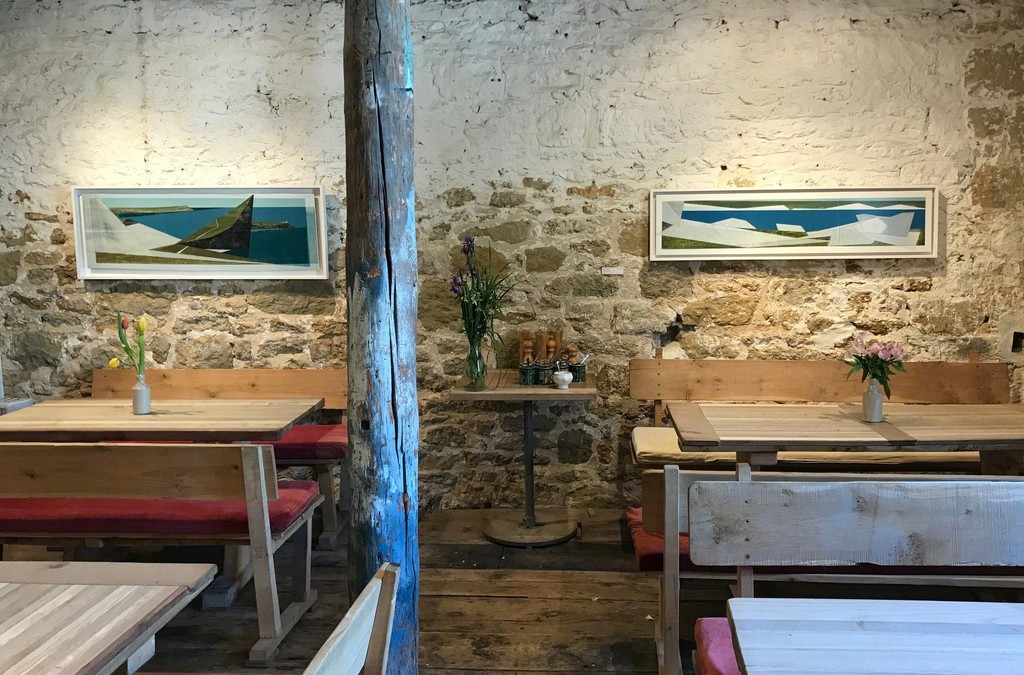 Winged Coast 1 and Quarry Edge 24 look fantastic in our Café. Their long landscape shape fits brilliantly above furniture like windows to a sea view. Winged Coast 1 and Quarry Edge 24 look fantastic in our Café. Their long landscape shape fits brilliantly above furniture like windows to a sea view.