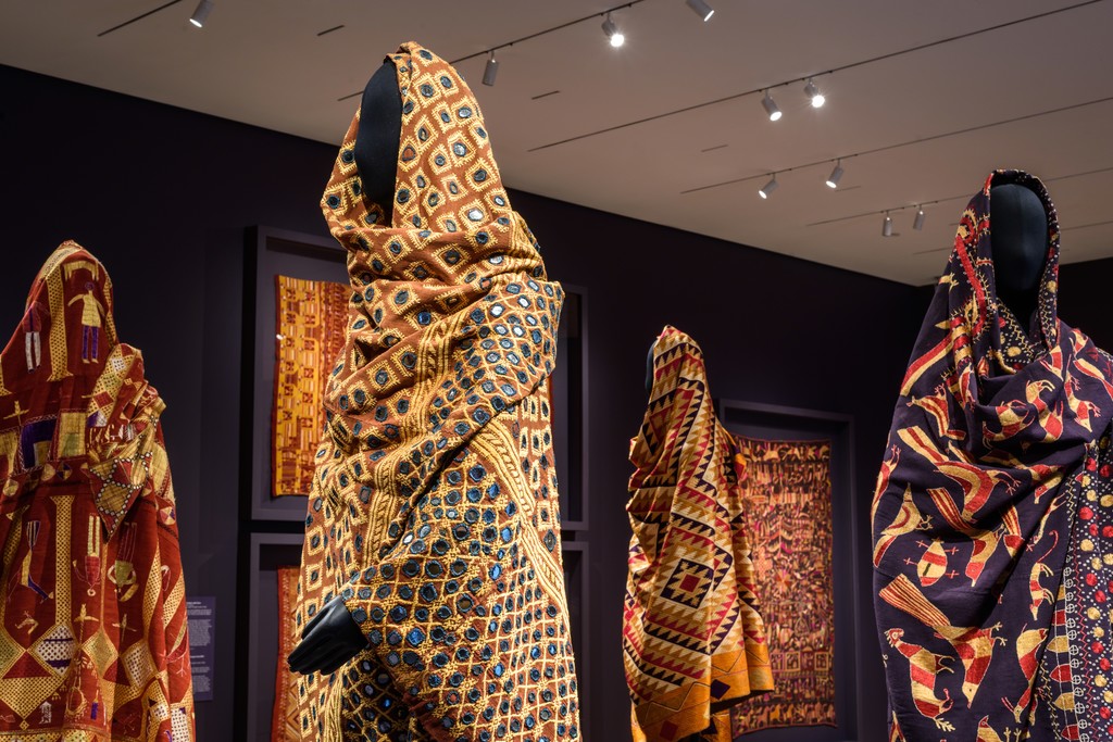 Installation Photograph of "Phulkari: The Embroidered Textiles of Punjab from the Jill and Sheldon Bonovitz Collection" Courtesy of the Philadelphia Museum of Art. Installation Photograph of "Phulkari: The Embroidered Textiles of Punjab from the Jill and Sheldon Bonovitz Collection" Courtesy of the Philadelphia Museum of Art.