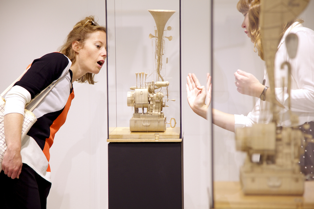 VOLTA guests react to Daniel Agdag’s automated cardboard machines, a solo presentation Sample of no value presented by MARS Gallery, Melbourne. Courtesy Nicholas Winter Photography. VOLTA guests react to Daniel Agdag’s automated cardboard machines, a solo presentation Sample of no value presented by MARS Gallery, Melbourne. Courtesy Nicholas Winter Photography.