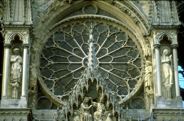 ‘Reims Cathedral: exterior, West facade, detail of rose window and gable over central portal (Coronation of the Virgin)’, ca. 1211-1290, Allan Kohl