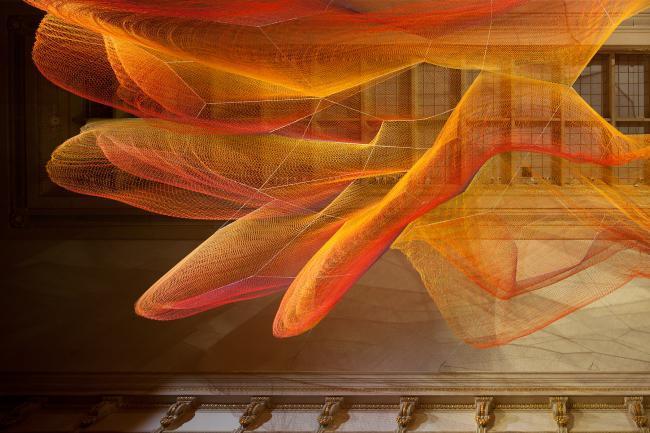 Janet Echelman, 1.8 Renwick, 2015, knotted and braided fiber with programmable lighting and wind movement above printed textile flooring, Smithsonian American Art Museum, photo by Ron Blunt Janet Echelman, 1.8 Renwick, 2015, knotted and braided fiber with programmable lighting and wind movement above printed textile flooring, Smithsonian American Art Museum, photo by Ron Blunt