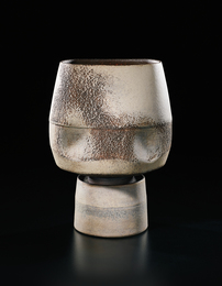 Pot with four indents and cylindrical foot