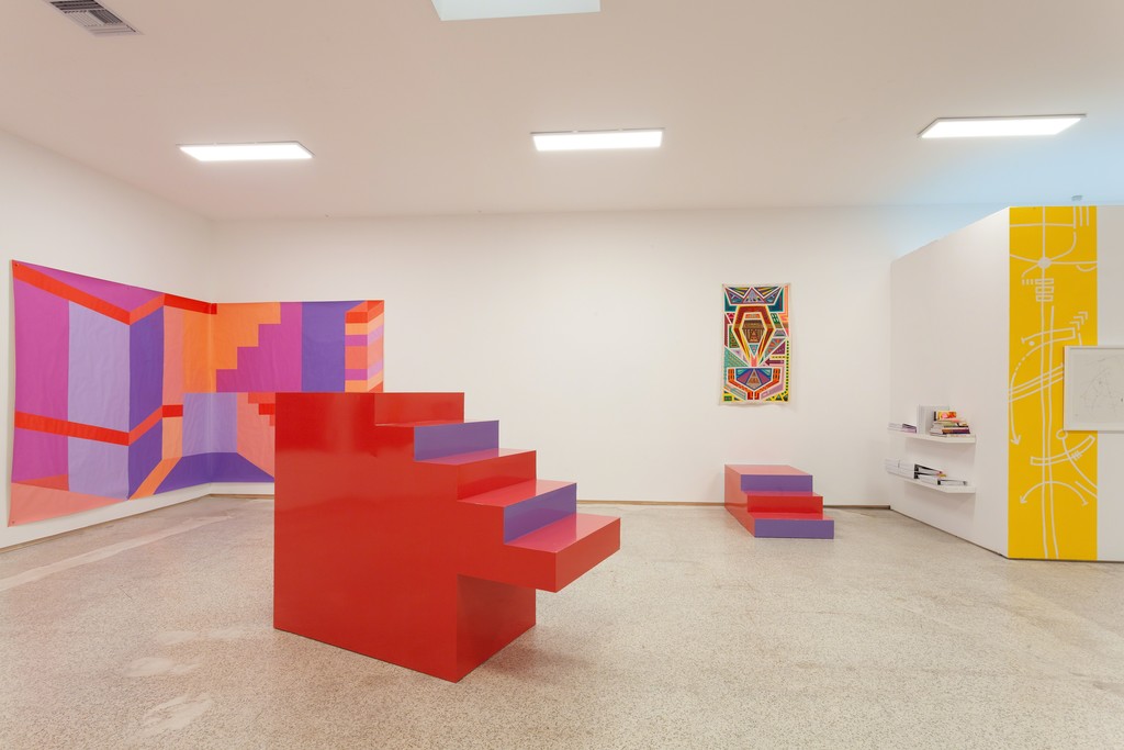 Installation view from left to right: Karen Rifas' Paradise Summit Miami, 2018. Marcus Blake's First Queen (Quantum Kente Series), 2018, (foreground) Germane Barnes and Karen Rifas, Exploding Staircase, 2018. Installation view from left to right: Karen Rifas' Paradise Summit Miami, 2018. Marcus Blake's First Queen (Quantum Kente Series), 2018, (foreground) Germane Barnes and Karen Rifas, Exploding Staircase, 2018.