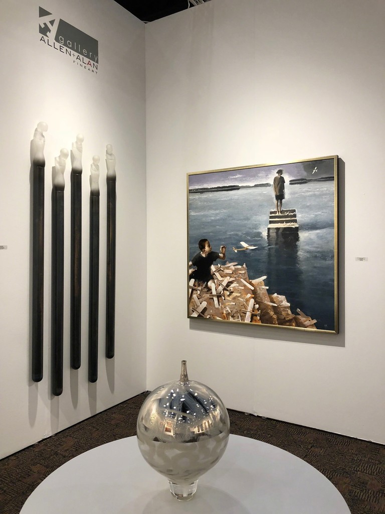 Seth Fairweather's cast glass figures, "Industrial Ascetics" and mirrored glass bowl work beautifully with Gary Ruddell's painting, "Where Words Can Not Be Heard" Booth 413 Seth Fairweather's cast glass figures, "Industrial Ascetics" and mirrored glass bowl work beautifully with Gary Ruddell's painting, "Where Words Can Not Be Heard" Booth 413