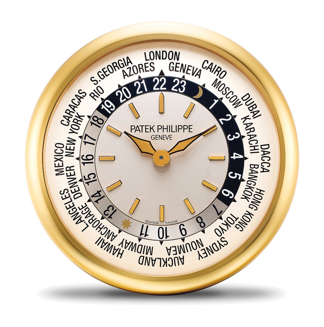 Patek Philippe An attractive brass world time wall clock with Instruction Manual (Circa 2000s