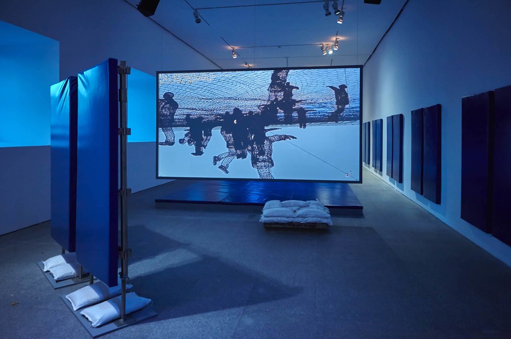 Installation view of "Hito Steyerl: Duty-Free Art" at Museo Nacional Centro de Arte Reina Sofia. November 2015. Photograph: Joaquìn Cortés/Román Lores. Installation view of "Hito Steyerl: Duty-Free Art" at Museo Nacional Centro de Arte Reina Sofia. November 2015. Photograph: Joaquìn Cortés/Román Lores.