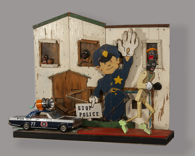 Kat Flyn, ‘Stop Police’, 2020, Sculpture, Assemblage sculpture: handmade deconstructed wood toy house facade, old wood racist stereotype dancing toy with paddle,vintage tin police car No 77 (South-Central Los Angeles) with broken siren (makes noise), handmade & painted wood policeman cutout, hand carved wood face in window., Jonathan Ferrara Gallery