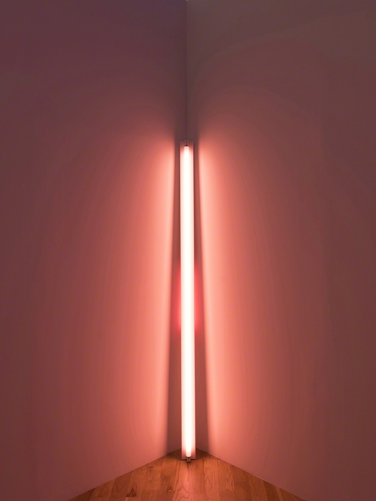 Dan Flavin, untitled, 1969. Pink and red fluorescent light. 8 ft. leaning into a corner with the top of the 20W tube touching the corner. Installation view: Dan Flavin: cornered fluorescent light, Mana Contemporary, Jersey City, 2018. Photo: John Berens. Courtesy of the Estate of Dan Flavin Dan Flavin, untitled, 1969. Pink and red fluorescent light. 8 ft. leaning into a corner with the top of the 20W tube touching the corner. Installation view: Dan Flavin: cornered fluorescent light, Mana Contemporary, Jersey City, 2018. Photo: John Berens. Courtesy of the Estate of Dan Flavin