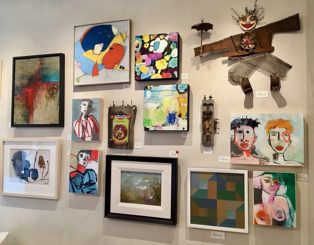 Grouping of small paintings and wall sculptures. Grouping of small paintings and wall sculptures.