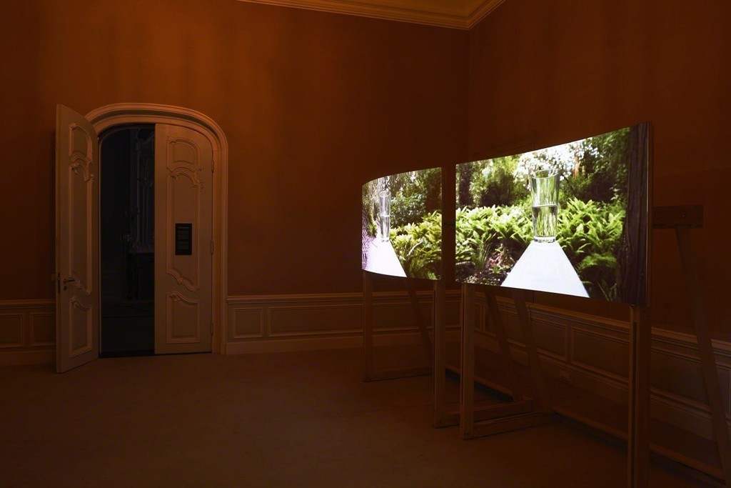 Gary Hill, Sine Wave, Installation with two fabricated free standing curved projection screens, 2011 Gary Hill, Sine Wave, Installation with two fabricated free standing curved projection screens, 2011